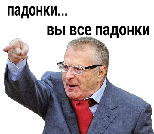Мужчина в костюме и очках агрессивно указывает пальцем вперед и кричит