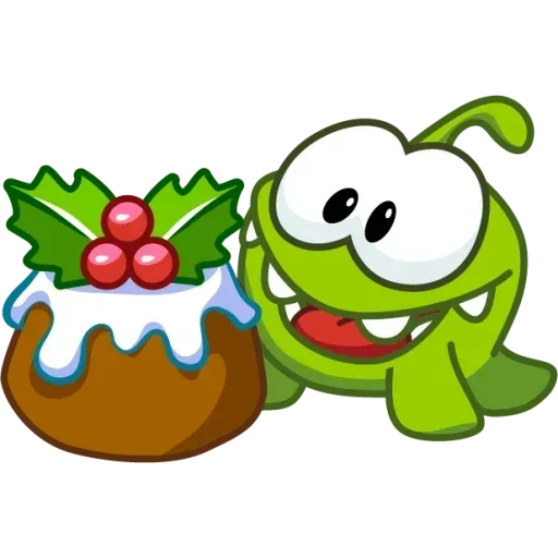 Зелёный монстр Om Nom радостно и с аппетитом смотрит на рождественский пудинг, украшенный падубом