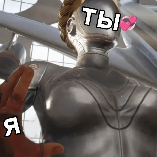 Человек тянет руку к роботу, робот стоит неподвижно, занимая почти всё пространство кадра.